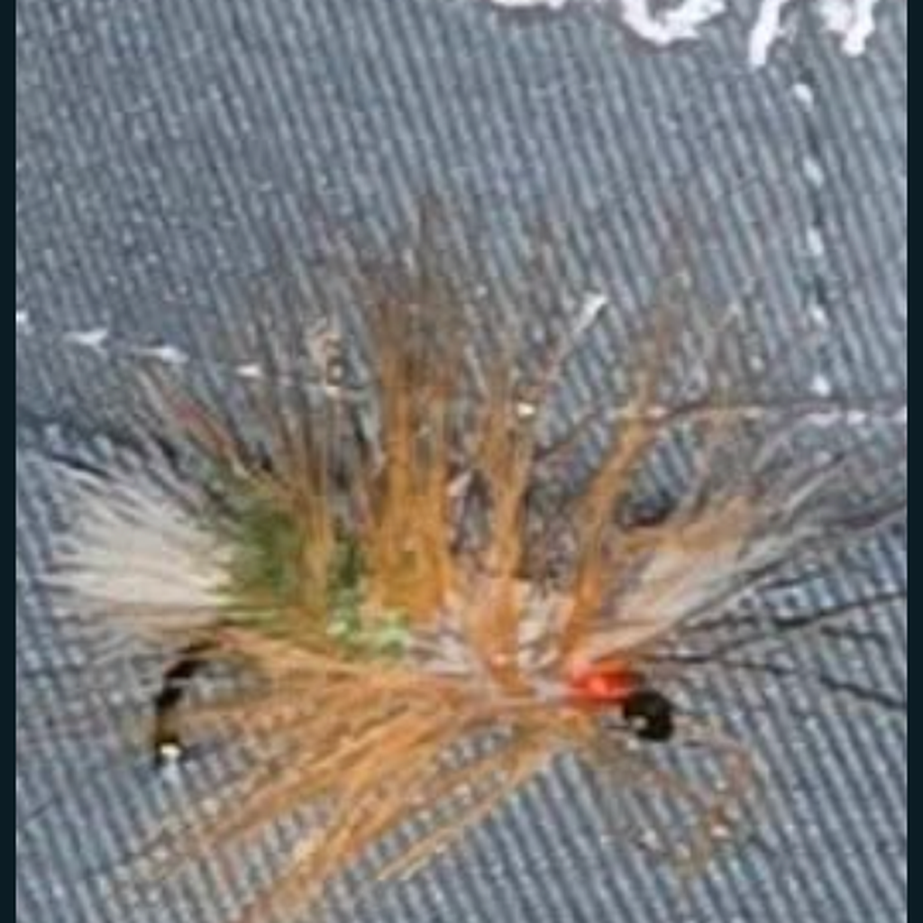 Paul’s Dirty Bomber — hand-tied Bomber on cap fabric, from owner-supplied still